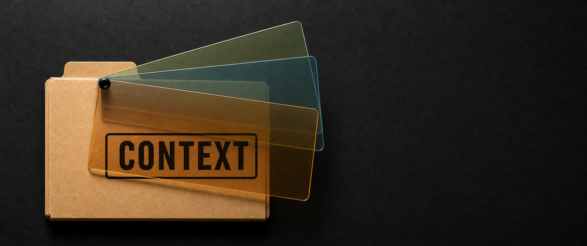 A manila folder labeled CONTEXT with three transparent colored rectangular lenses fanned over it.